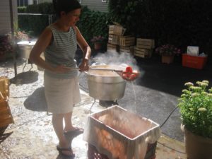 Josephine, Dolores' aunt, doing the tomatoes in 2009.